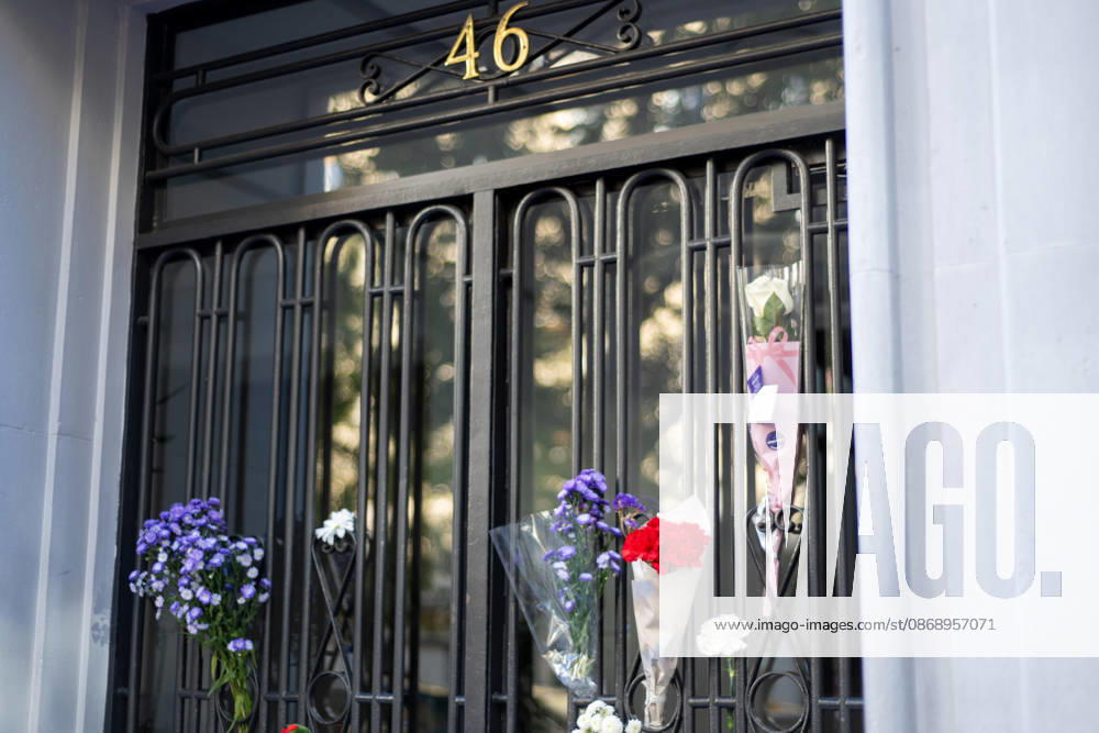 Flowers are seen attached to the entrance of the apartment building where Maricarmen lived, on Alcalde Sainz de Baranda street in Madrid. The tribute follows the death in hospital of the 87 year old woman, whose eviction sparked protests over Spains housing crisis. Madrid, Spain, October 8, 2026 Madrid Spain - ZUMAc317 20261008_zip_c317_004