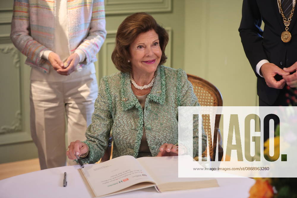 Königin Silvia von Schweden beim Eintrag ins Goldene Buch der Stadt Konstanz zum Jubiläum der Mentor-Stiftung auf der Insel Mainau. Mainau