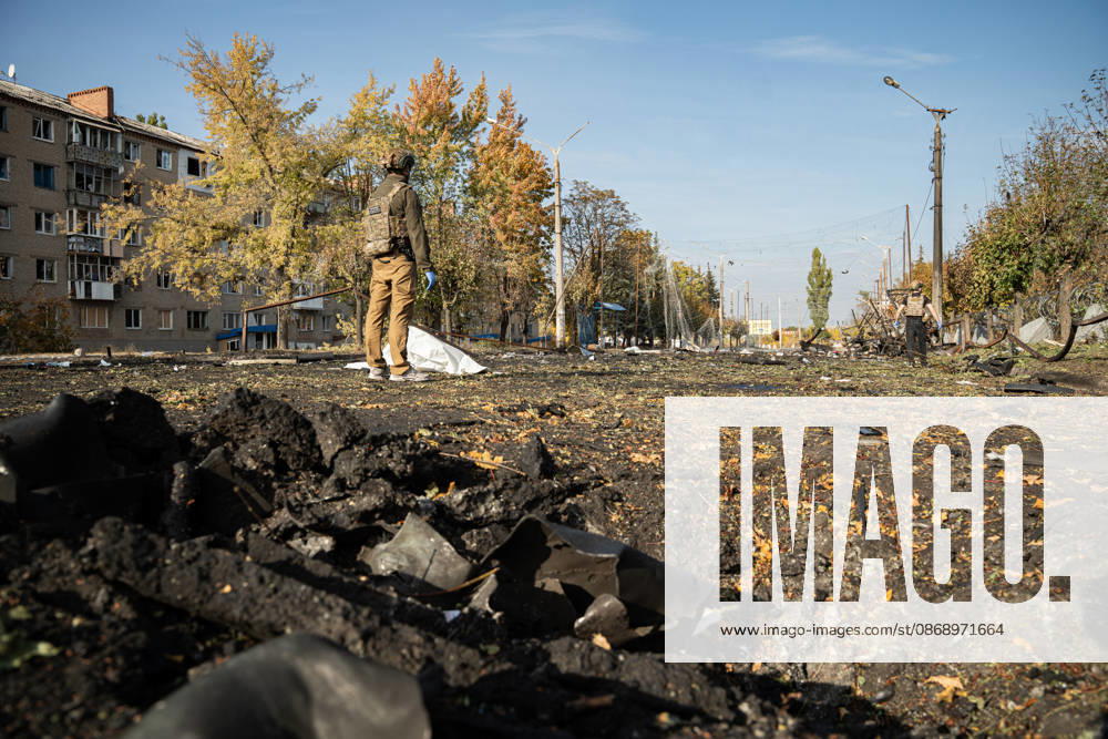 Russian Strike Hits Kramatorsk Buses A first responder stands on a heavily damaged street near a fully covered body after a Russian strike in Kramatorsk, Donetsk region, Ukraine, on October 8, 2026. Ukrainian authorities said a Russian guided bomb struck two scheduled passenger buses in Kramatorsk at about 10:00. At least 30 people were killed and at least 18 wounded, while Ukraine s State Emergency Service later reported 33 deaths; public transport in Kramatorsk and nearby Sloviansk was suspended after the attack. Kramatorsk Donetsk Ukraine