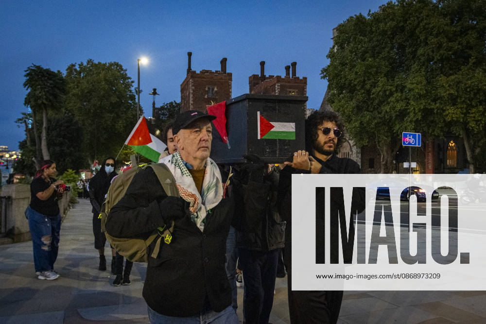 Pro-Palestine Silent Funeral Procession Central London, October 8, 2026 A pro-Palestine silent funeral procession took place in Central London, with demonstrators walking in silence to remember Palestinians killed in the conflict in Gaza. Participants carried Palestinian flags and placards, while some held a coffin and others carried effigies wrapped in burial shrouds, symbolising those killed in the conflict., Credit:Zak Irfan Avalon