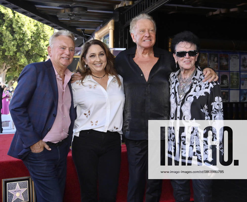 Russell Hitchcock (R) of the rock duo Air Supply is joined by Pat Sajak, his wife Lesley Brown and Hitchcocks wife Cari Hitchcock (L-R) during an unveiling ceremony honoring the duo with the 2,859th star on the Hollywood Walk of Fame in Los Angeles on Thursday October 8, 2026. LAP2026100828 JIMxRUYMEN