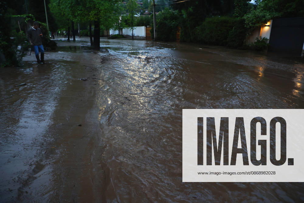 Santiago, October 8, 2026: A mudslide is affecting the area from San Carlos de Apoquindo to Los Dominicos in the Las Condes district, causing widespread damage and sweeping away vehicles and people. Dragomir Yankovic Aton, Chile, Santiago, Chile Aton 1197964