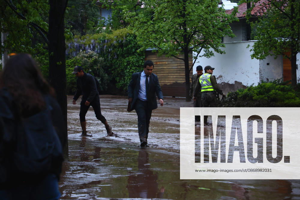 Santiago, October 8, 2026: A mudslide is affecting the area from San Carlos de Apoquindo to Los Dominicos in the Las Condes district, causing widespread damage and sweeping away vehicles and people. Dragomir Yankovic Aton, Chile, Santiago, Chile Aton 1197967