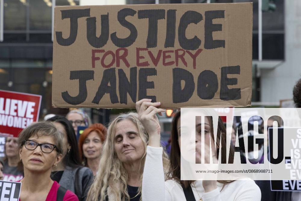 A demonstrator holds a sign that reads JUSTICE FOR EVERY JANE DOE joining hundreds at a rally in Foley Square outside the New York State Supreme Court building in Lower Manhattan under the banner . StopSexualViolence: From the Frat House to the White House. The protest is one of many rallies and campus walkouts around the country demanding justice for Cornell s Jane Doe. New York USA - ZUMAr174 20261008_znp_r174_016