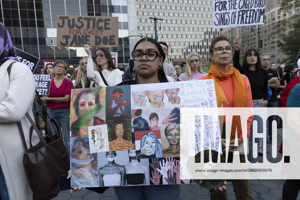 Demonstrators hold signs that read hashtag METOO RapeCulture IAmJaneDoe JUSTICE FOR EVERY JANE DOE joining hundreds at a rally in Foley Square outside the New York State Supreme Court building in Lower Manhattan under the banner . StopSexualViolence: From the Frat House to the White House. The protest is one of many rallies and campus walkouts around the country demanding justice for Cornell s Jane Doe. New York USA - ZUMAr174 20261008_znp_r174_035