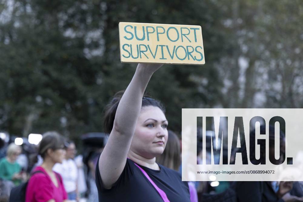 A demonstrator holds a sign that reads SUPPORT SURVIVORS joining hundreds at a rally in Foley Square outside the New York State Supreme Court building in Lower Manhattan under the banner . StopSexualViolence: From the Frat House to the White House. The protest is one of many rallies and campus walkouts around the country demanding justice for Cornell s Jane Doe. New York USA - ZUMAr174 20261008_znp_r174_019