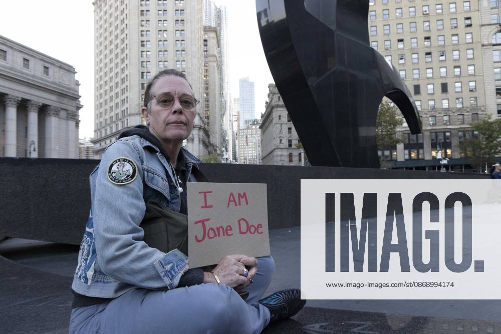 A demonstrator holds a sign that reads I AM Jane Doe joining hundreds at a rally in Foley Square outside the New York State Supreme Court building in Lower Manhattan under the banner . StopSexualViolence: From the Frat House to the White House. The protest is one of many rallies and campus walkouts around the country demanding justice for Cornell s Jane Doe. New York USA - ZUMAr174 20261008_znp_r174_031