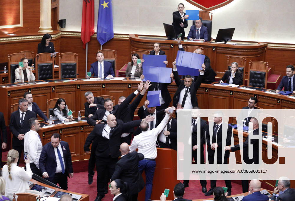 Albanian Parliament Vote the Territorial Reform in Tirana, Albania. Bodyguards try to protect Albanian Prime Minister Edi Rama (C) as an opposition MP throws a water bottle during a parliamentary session where a government s proposed administrative and territorial reform is voted on in Tirana, Albania, early on October 9, 2026. Light Studio Agency Malton Dibra Tirana Albania