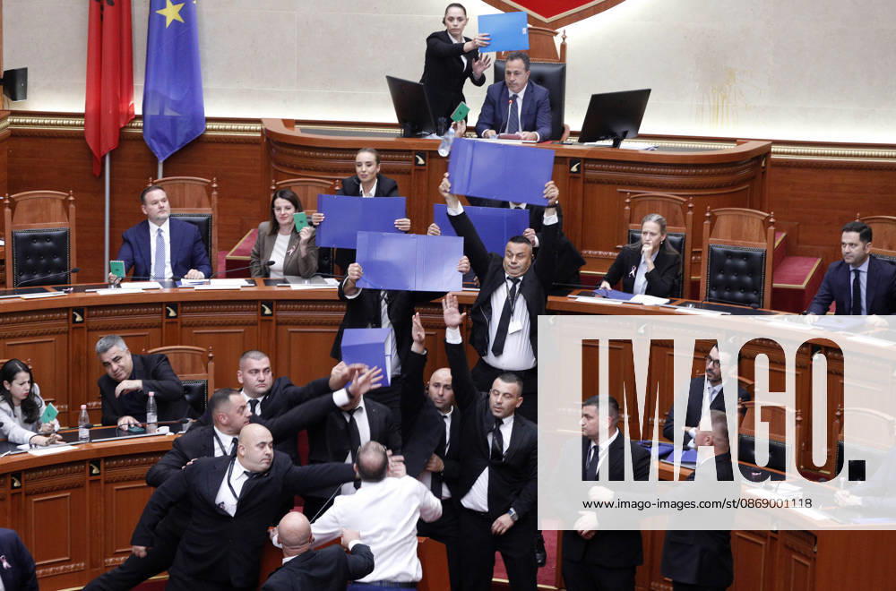 Albanian Parliament Vote the Territorial Reform in Tirana, Albania. Bodyguards try to protect Albanian Prime Minister Edi Rama (C) as an opposition MP throws a water bottle during a parliamentary session where a government s proposed administrative and territorial reform is voted on in Tirana, Albania, early on October 9, 2026. Light Studio Agency Malton Dibra Tirana Albania