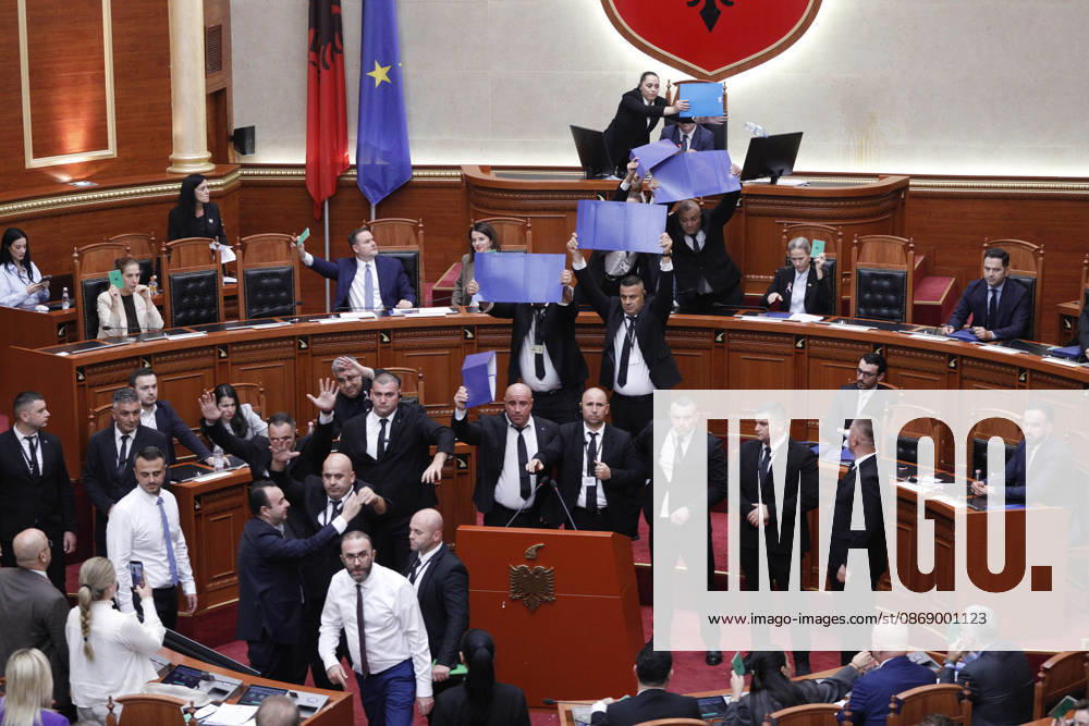 Albanian Parliament Vote the Territorial Reform in Tirana, Albania. Bodyguards try to protect Albanian Prime Minister Edi Rama (C) as an opposition MP throws a water bottle during a parliamentary session where a government s proposed administrative and territorial reform is voted on in Tirana, Albania, early on October 9, 2026. Light Studio Agency Malton Dibra Tirana Albania