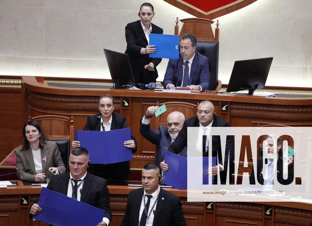 Albanian Parliament Vote the Territorial Reform in Tirana, Albania. Bodyguards try to protect Albanian Prime Minister Edi Rama (C) as an opposition MP throws a water bottle during a parliamentary session where a government s proposed administrative and territorial reform is voted on in Tirana, Albania, early on October 9, 2026. Light Studio Agency Malton Dibra Tirana Albania