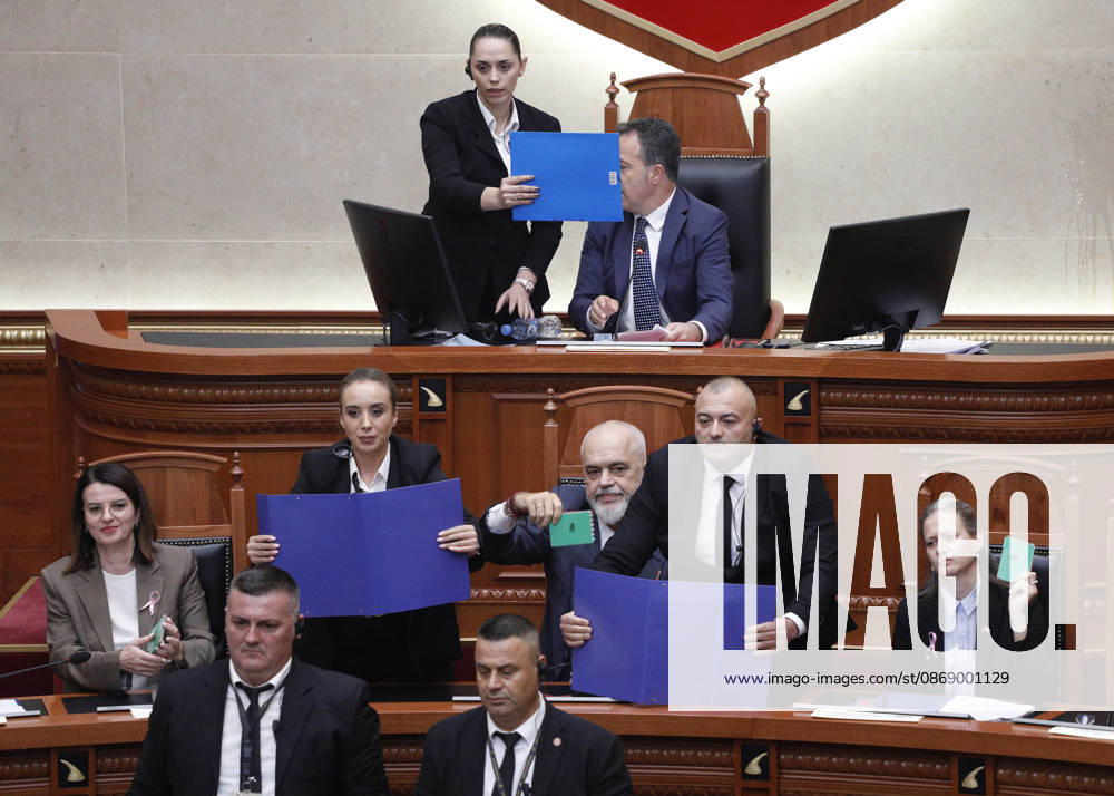 Albanian Parliament Vote the Territorial Reform in Tirana, Albania. Bodyguards try to protect Albanian Prime Minister Edi Rama (C) as an opposition MP throws a water bottle during a parliamentary session where a government s proposed administrative and territorial reform is voted on in Tirana, Albania, early on October 9, 2026. Light Studio Agency Malton Dibra Tirana Albania