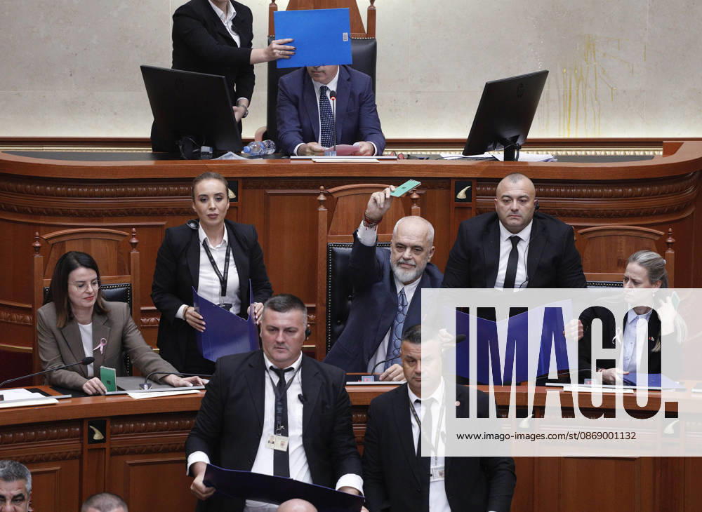 Albanian Parliament Vote the Territorial Reform in Tirana, Albania. Bodyguards try to protect Albanian Prime Minister Edi Rama (C) as an opposition MP throws a water bottle during a parliamentary session where a government s proposed administrative and territorial reform is voted on in Tirana, Albania, early on October 9, 2026. Light Studio Agency Malton Dibra Tirana Albania