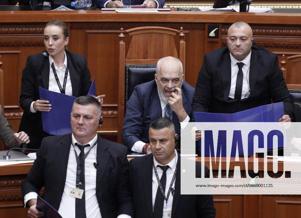 Albanian Parliament Vote the Territorial Reform in Tirana, Albania. Bodyguards try to protect Albanian Prime Minister Edi Rama (C) as an opposition MP throws a water bottle during a parliamentary session where a government s proposed administrative and territorial reform is voted on in Tirana, Albania, early on October 9, 2026. Light Studio Agency Malton Dibra Tirana Albania