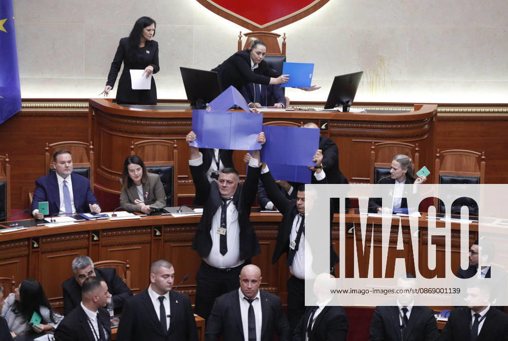 Albanian Parliament Vote the Territorial Reform in Tirana, Albania. Bodyguards try to protect Albanian Prime Minister Edi Rama (C) as an opposition MP throws a water bottle during a parliamentary session where a government s proposed administrative and territorial reform is voted on in Tirana, Albania, early on October 9, 2026. Light Studio Agency Malton Dibra Tirana Albania