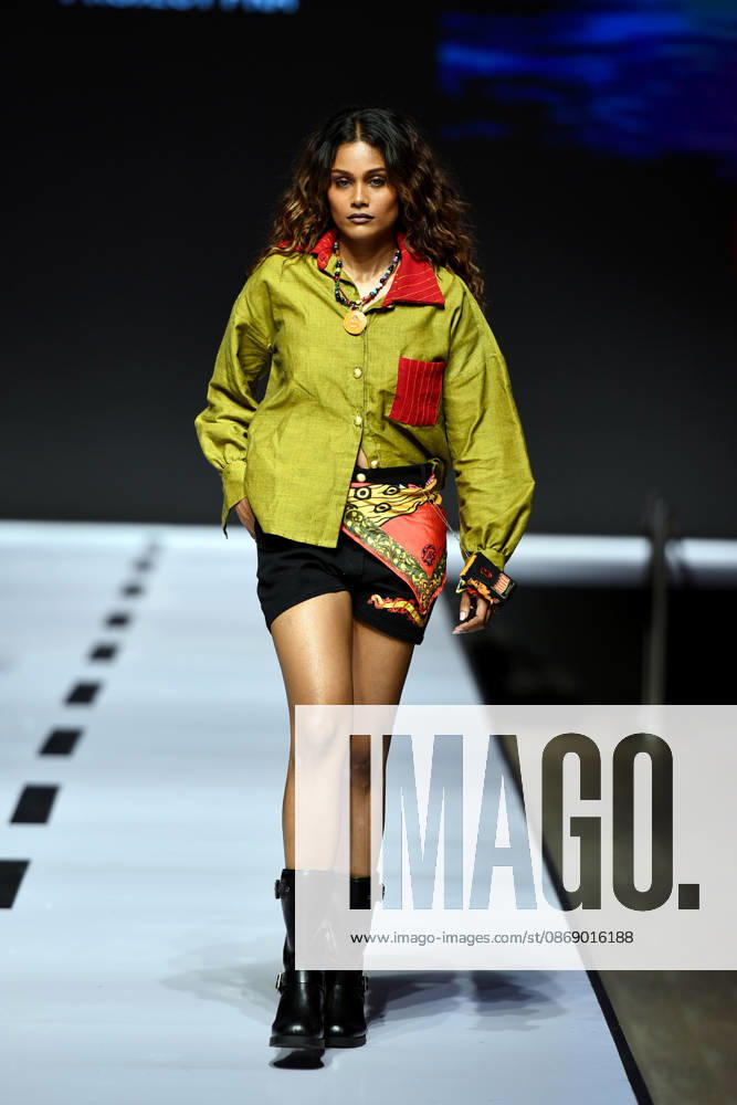 (261009) -- COLOMBO, Oct. 9, 2026 -- A model presents a creation during the Mercedes-Benz Fashion Week Sri Lanka in Colombo, Sri Lanka on Oct. 8, 2026. The event is held here from Oct. 7 to 11. (Photo by Xinhua) SRI LANKA-COLOMBO-FASHION WEEK GayanxSameera