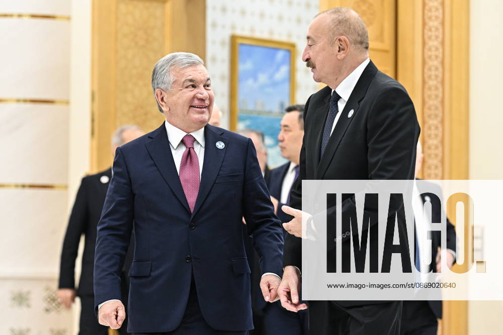 TURKMENISTAN, BALKAN PROVINCE - OCTOBER 9, 2026: Uzbekistan s President Shavkat Mirziyoyev (L) and Azerbaijan s President Ilham Aliyev ahead of a photo op for participants of a meeting of the CIS Council of Heads of State in Turkmenbasy Turkmenistan - ZUMAt113 20261009_zaa_t113_020