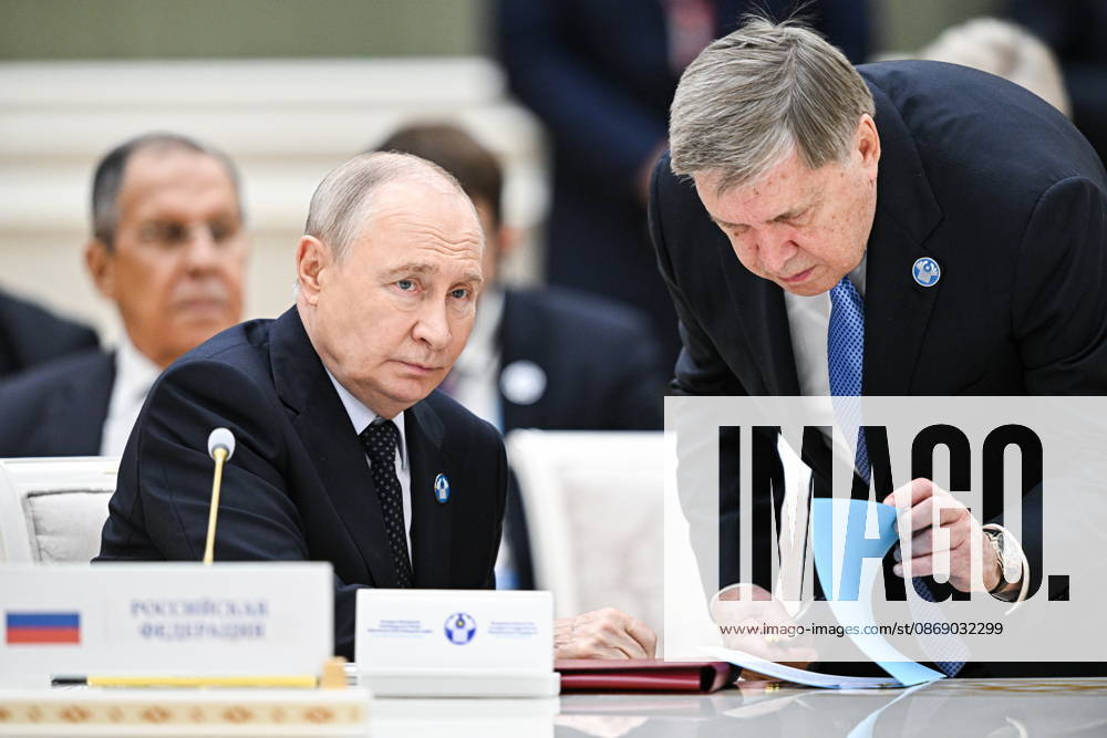 TURKMENISTAN, BALKAN PROVINCE - OCTOBER 9, 2026: Russia s President Vladimir Putin (L) and his adviser Yuri Ushakov during a narrow-format meeting of the CIS Council of Heads of State in Turkmenbashi Turkmenistan - ZUMAt113 20261009_zaa_t113_139