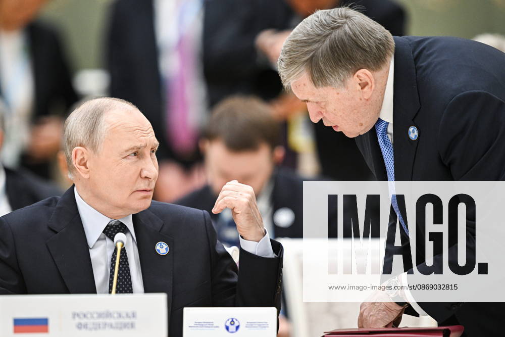 TURKMENISTAN, BALKAN PROVINCE - OCTOBER 9, 2026: Russia s President Vladimir Putin (L) and his adviser Yuri Ushakov during a narrow-format meeting of the CIS Council of Heads of State in Turkmenbashi Turkmenistan - ZUMAt113 20261009_zaa_t113_151