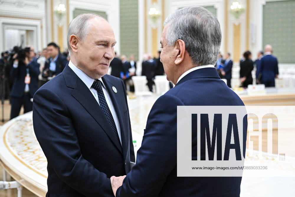 TURKMENISTAN, BALKAN PROVINCE - OCTOBER 9, 2026: Russia s President Vladimir Putin (L) and Uzbekistan s President Shavkat Mirziyoyev shake hands after a narrow-format meeting of the CIS Council of Heads of State in Turkmenbashi Turkmenistan - ZUMAt113 20261009_zaa_t113_160