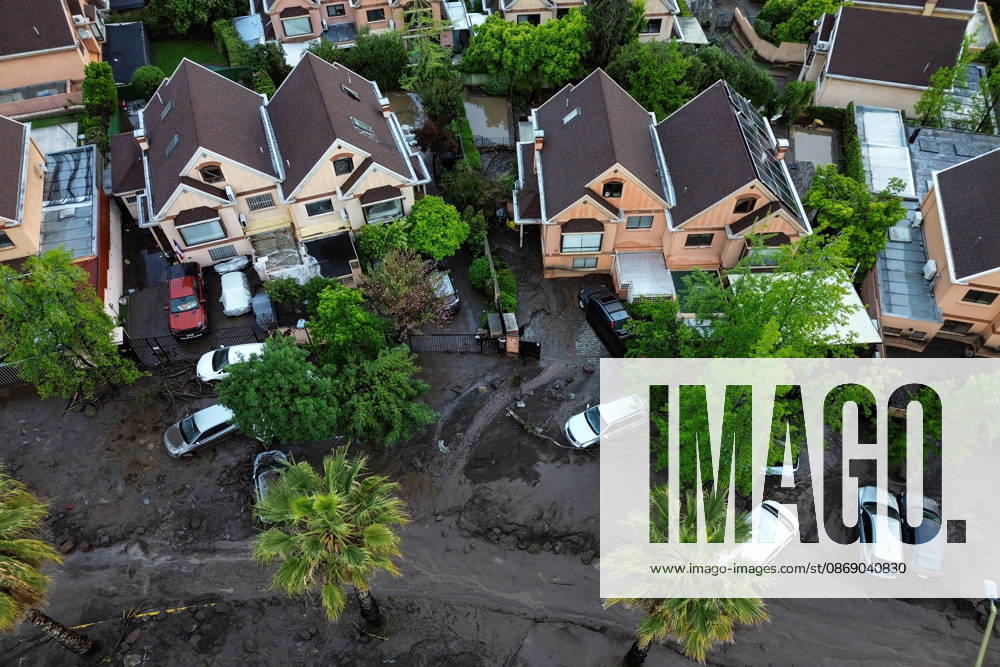 Santiago, October 9, 2026: Consequences of a mudslide that affected the area from San Carlos de Apoquindo to Los Dominicos in the Las Condes district, causing widespread damage and sweeping away vehicles and people. Diego Martin Aton, Chile, Aton 1198078 jpeg