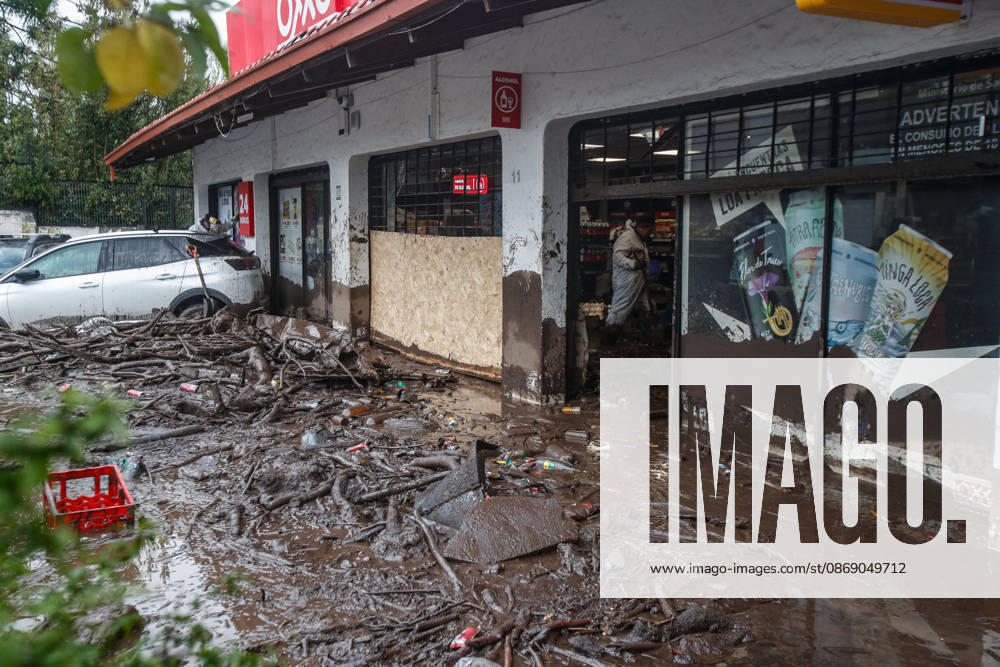 Santiago, October 9, 2026: Consequences of a mudslide that affected the area from San Carlos de Apoquindo to Los Dominicos in the Las Condes district, causing widespread damage and sweeping away vehicles and people. Diego Martin Aton, Chile, Aton 1198111 jpeg