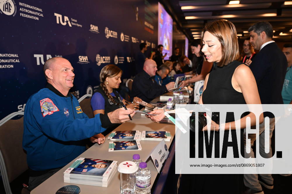 Astronauts meet visitors at autograph session during International Astronautical Congress ANTALYA, TURKIYE - OCTOBER 09: Astronauts from various countries meet visitors during an autograph session on Public Day of the 77th International Astronautical Congress (IAC 2026) at the NEST Congress Center in Antalya, Turkiye, on October 09, 2026. Organized by the International Astronautical Federation (IAF) under the coordination of the Ministry of Industry and Technology and hosted by the Turkish Space Agency (TUA) and SAHA Istanbul, the congress opens its doors to the public on its final day. Muhammed Abdullah Kurtar Anadolu Antalya Turkey. Editorial use only. Please get in touch for any other usage.
