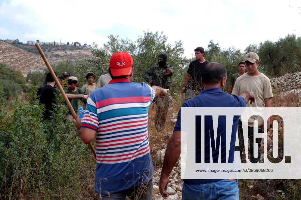 Clashes erupt between Israeli settlers and Palestinian farmers in West Bank RAMALLAH, WEST BANK - OCTOBER 9: Clashes break out between Israeli settlers, accompanied by Israeli soldiers, and Palestinian farmers harvesting olives in the town of Deir Ibzi, near Ramallah in West Bank, on October 9, 2026. The incident reportedly involved damage to olive crops and provocative actions by the settlers. Issam Rimawi Anadolu West Bank Palestine. Editorial use only. Please get in touch for any other usage.