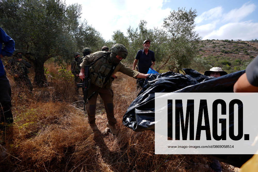Clashes erupt between Israeli settlers and Palestinian farmers in West Bank RAMALLAH, WEST BANK - OCTOBER 9: Clashes break out between Israeli settlers, accompanied by Israeli soldiers, and Palestinian farmers harvesting olives in the town of Deir Ibzi, near Ramallah in West Bank, on October 9, 2026. The incident reportedly involved damage to olive crops and provocative actions by the settlers. Issam Rimawi Anadolu West Bank Palestine. Editorial use only. Please get in touch for any other usage.