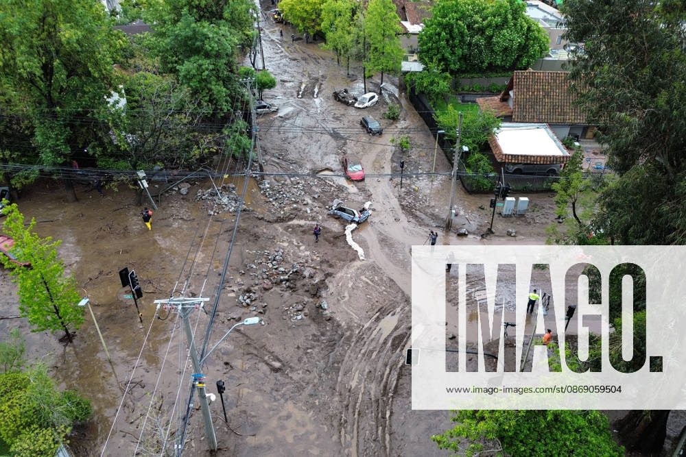 Santiago, October 9, 2026: Consequences of a mudslide that affected the area from San Carlos de Apoquindo to Los Dominicos in the Las Condes district, causing widespread damage and sweeping away vehicles and people. Diego Martin Aton, Chile, Aton 1198126 jpeg