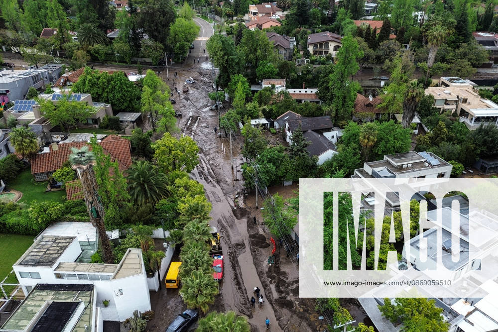 Santiago, October 9, 2026: Consequences of a mudslide that affected the area from San Carlos de Apoquindo to Los Dominicos in the Las Condes district, causing widespread damage and sweeping away vehicles and people. Diego Martin Aton, Chile, Aton 1198132 jpeg