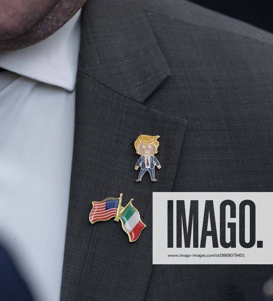 An unidentified guest wears a Trump lapel pin as United States President Donald J Trump hosts a Columbus Day Celebration in the East Room of the White House in Washington, DC, USA on Friday, October 8, 2026 Washington USA - ZUMAs152 20261009_faa_s152_010