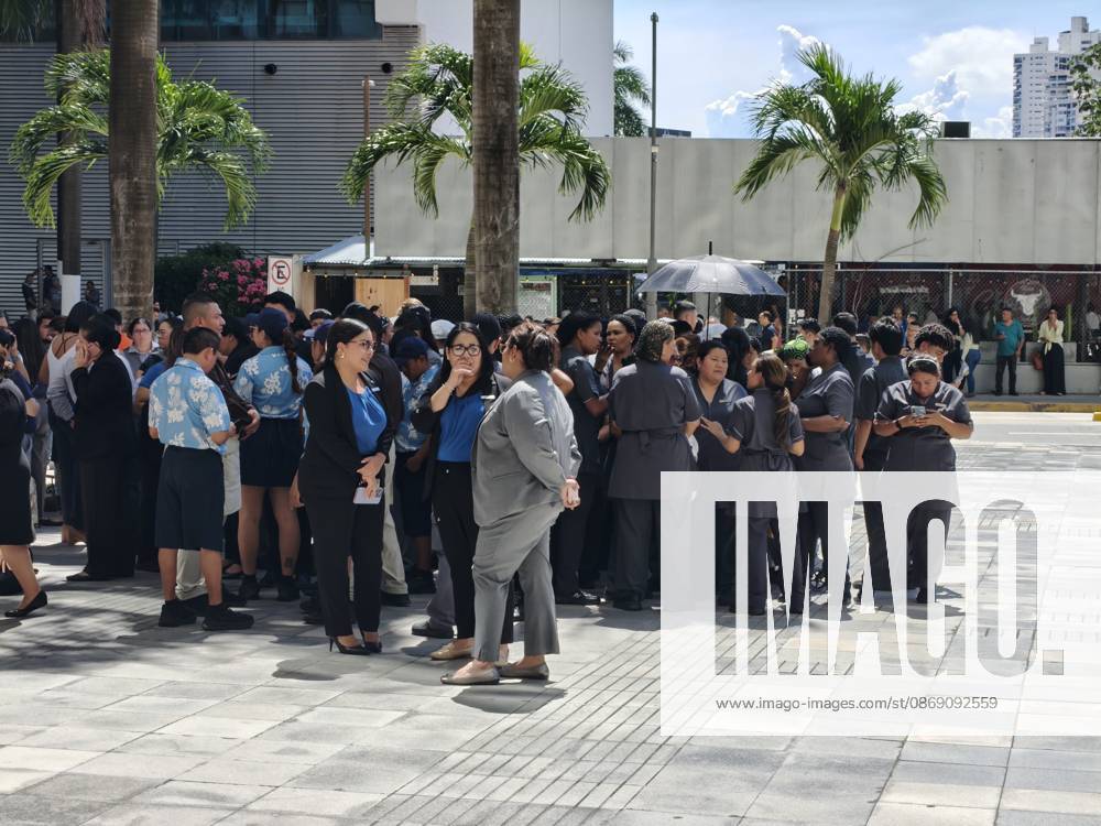 (261009) -- PANAMA CITY, Oct. 9, 2026 -- People gather outside following an earthquake in Panama City, Panama, Oct. 9, 2026. A major earthquake struck Panama on Friday. ) PANAMA-PANAMA CITY-EARTHQUAKE LixJiaxu