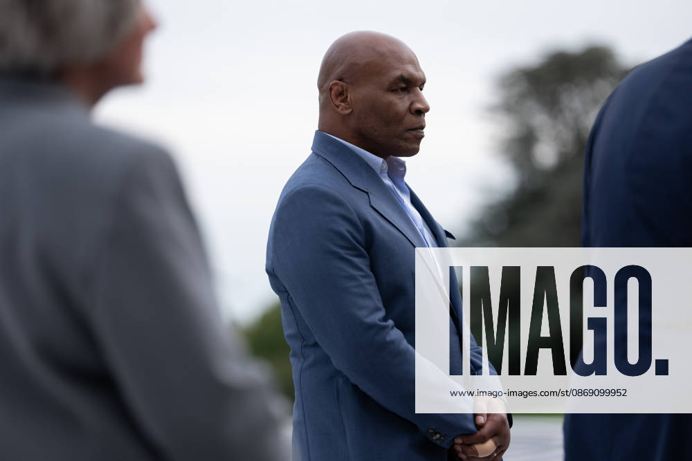 Former professional boxer Mike Tyson stands on the South Lawn of the White House before boarding Marine One in Washington, DC on Friday, Oct. 9, 2026. President Donald Trump is heading to Syracuse on Friday to boost Republican gubernatorial candidate Bruce Blakeman, who is trailing Governor Kathy Hochul in polls ahead of November s election. WASP20261009159 AaronxSchwartz