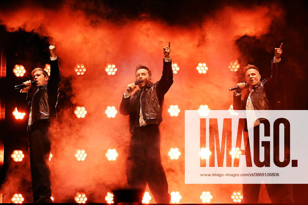 Westlife performing during the 25th Anniversary Tour LONDON, ENGLAND - OCTOBER 09: Kian Egan, Shane Filan and Nicky Byrne of ˜Westlife performing during the 25th Anniversary Tour at O2 Arena on October 09 in London, England. CAP MAR MAR Great Britain