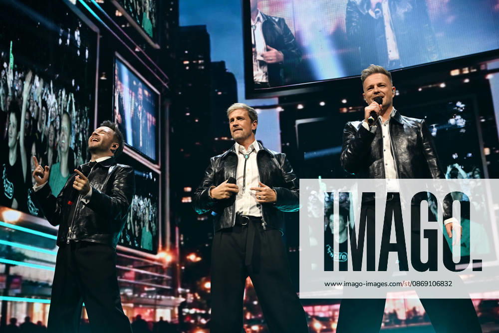 Westlife performing during the 25th Anniversary Tour LONDON, ENGLAND - OCTOBER 09: Shane Filan, Kian Egan and Nicky Byrne of ˜Westlife performing during the 25th Anniversary Tour at O2 Arena on October 09 in London, England. CAP MAR MAR Great Britain
