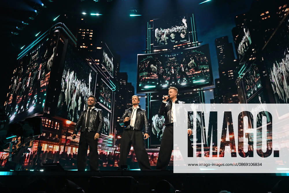 Westlife performing during the 25th Anniversary Tour LONDON, ENGLAND - OCTOBER 09: Shane Filan, Kian Egan and Nicky Byrne of ˜Westlife performing during the 25th Anniversary Tour at O2 Arena on October 09 in London, England. CAP MAR MAR Great Britain