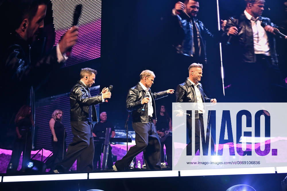 Westlife performing during the 25th Anniversary Tour LONDON, ENGLAND - OCTOBER 09: Shane Filan, Kian Egan and Nicky Byrne of ˜Westlife performing during the 25th Anniversary Tour at O2 Arena on October 09 in London, England. CAP MAR MAR Great Britain