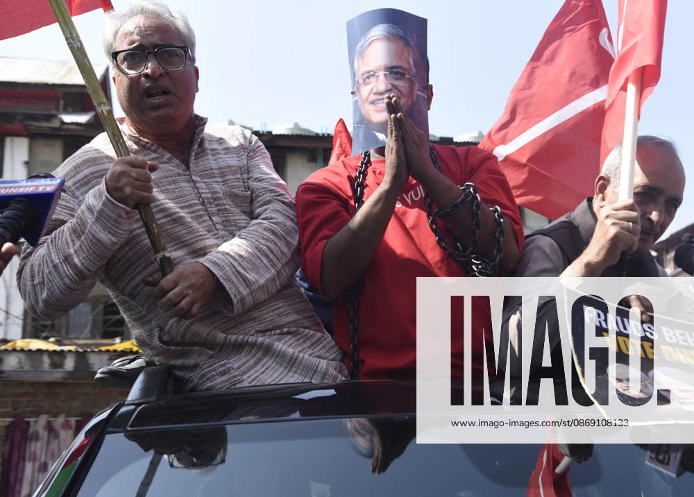 An INDIA bloc supporter wearing a mask depicting Chief Election Commissioner Gyanesh Kumar and holding a chain during a protest demanding the resignation of India s Chief Election Commissioner Gyanesh Kumar over alleged voter roll irregularities linked to the special intensive revision (SIR), in Srinagar on October 10, 2026. Srinagar India - ZUMAz120 20261010_zip_z120_011