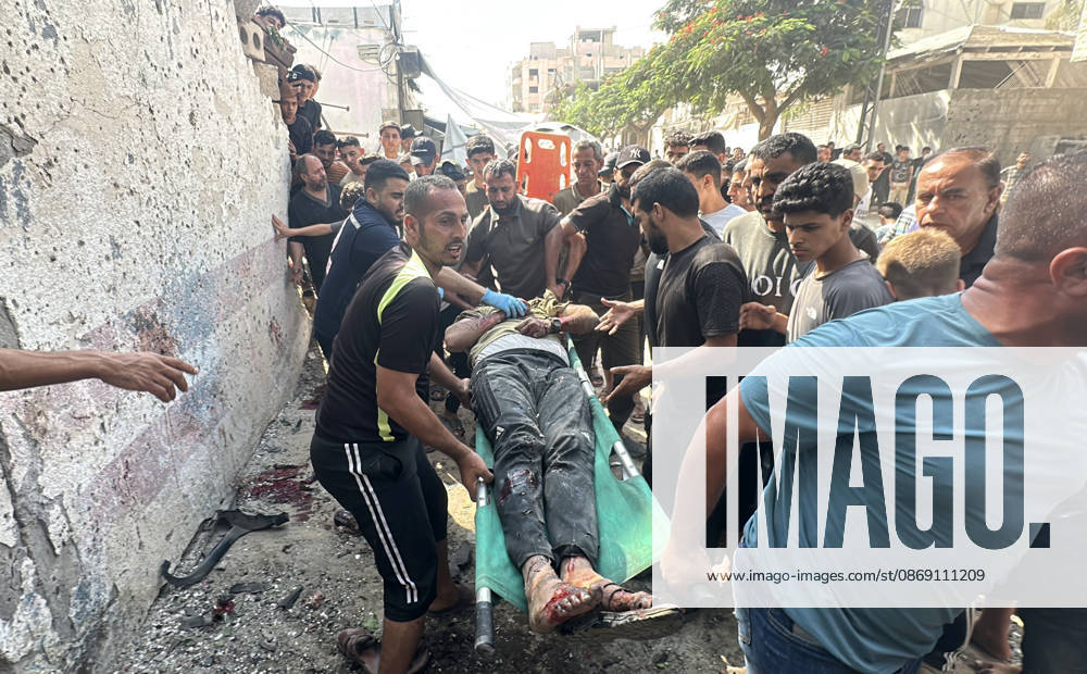 Palestinians Transport Dead and Wounded Following Israeli Airstrike in Gaza City Palestinians transport the bodies of people killed and others wounded to al-Shifa Hospital in Gaza City, on October 10, 2026, following an Israeli airstrike targeting a group of Palestinians in the western part of the city. Photo by Mohammed Salha apaimages Gaza Gaza Strip Palestinian Territory 101026_Gaza_MS_00(4)