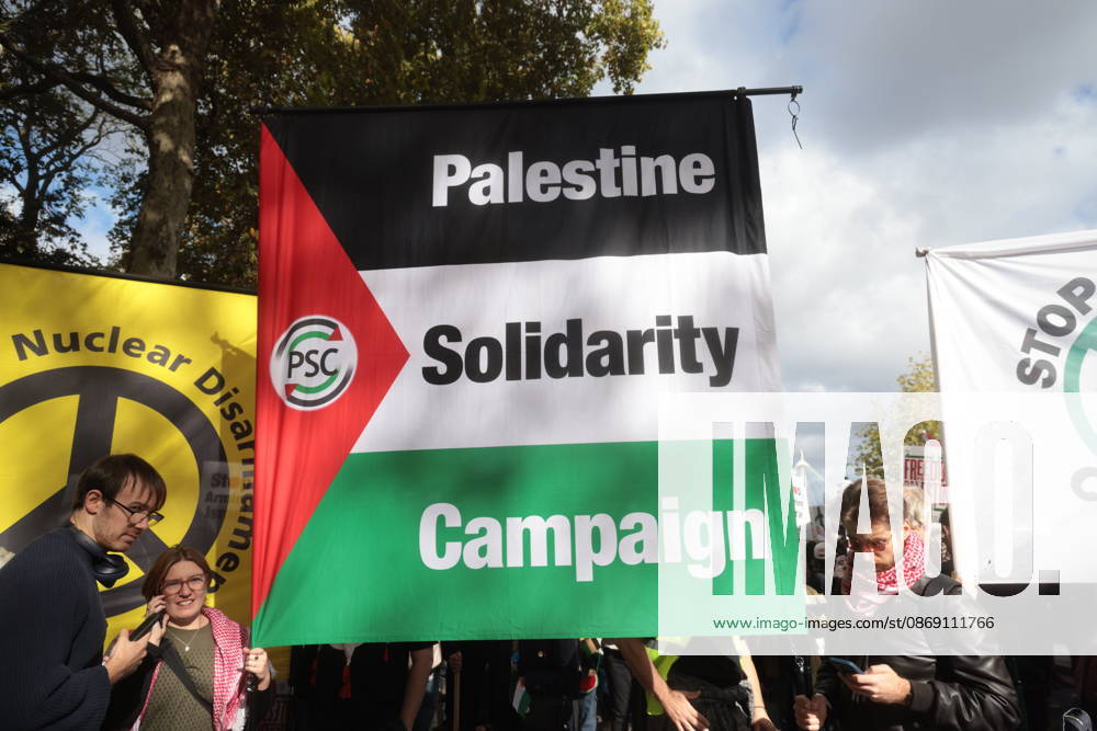London, United Kingdom. Palestine Coalition Protest. Palestine Coalition protest march through London, with zionist counter protesters gathered outside New Scotland Yard.