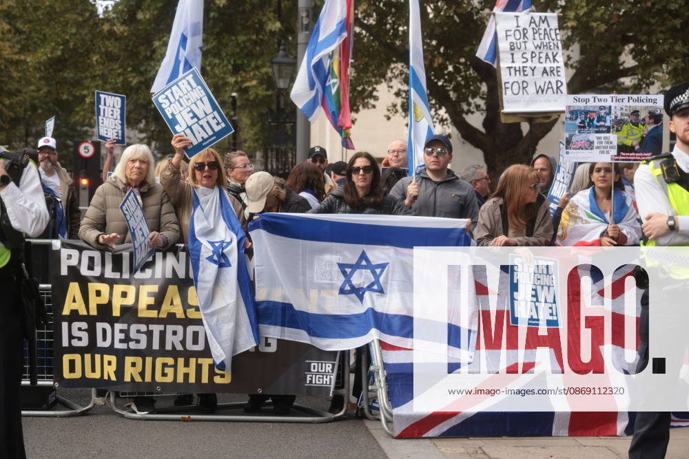 London, United Kingdom. Palestine Coalition Protest. Palestine Coalition protest march through London, with zionist counter protesters gathered outside New Scotland Yard.