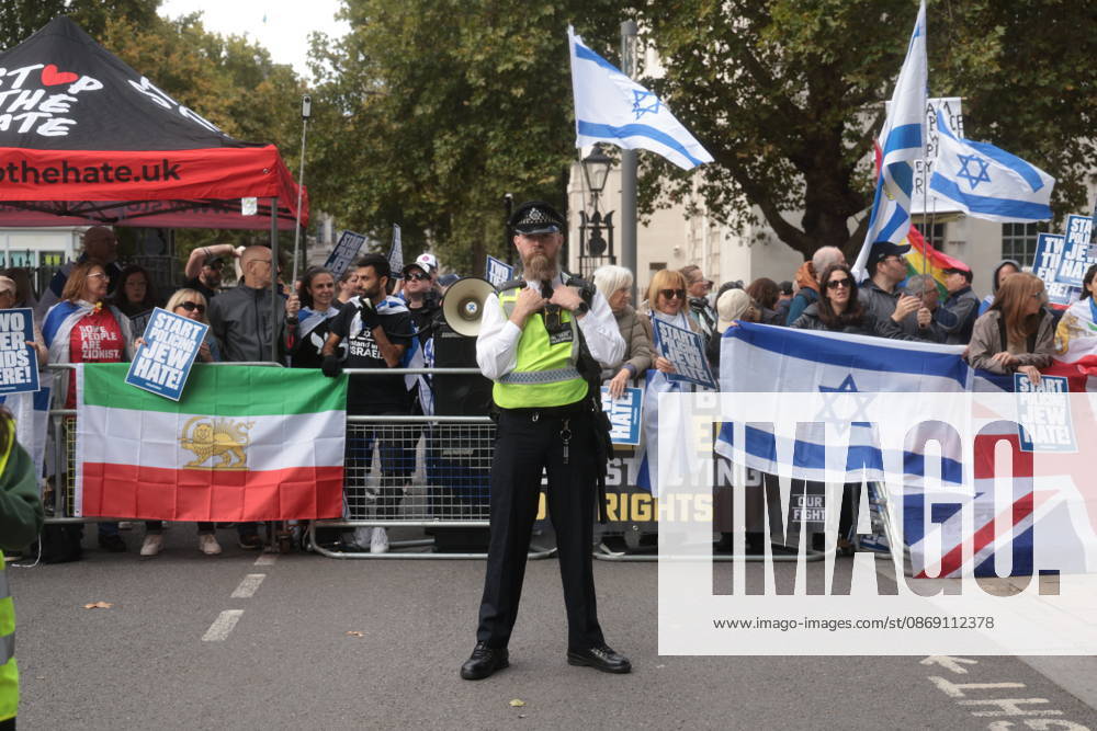 London, United Kingdom. Palestine Coalition Protest. Palestine Coalition protest march through London, with zionist counter protesters gathered outside New Scotland Yard.