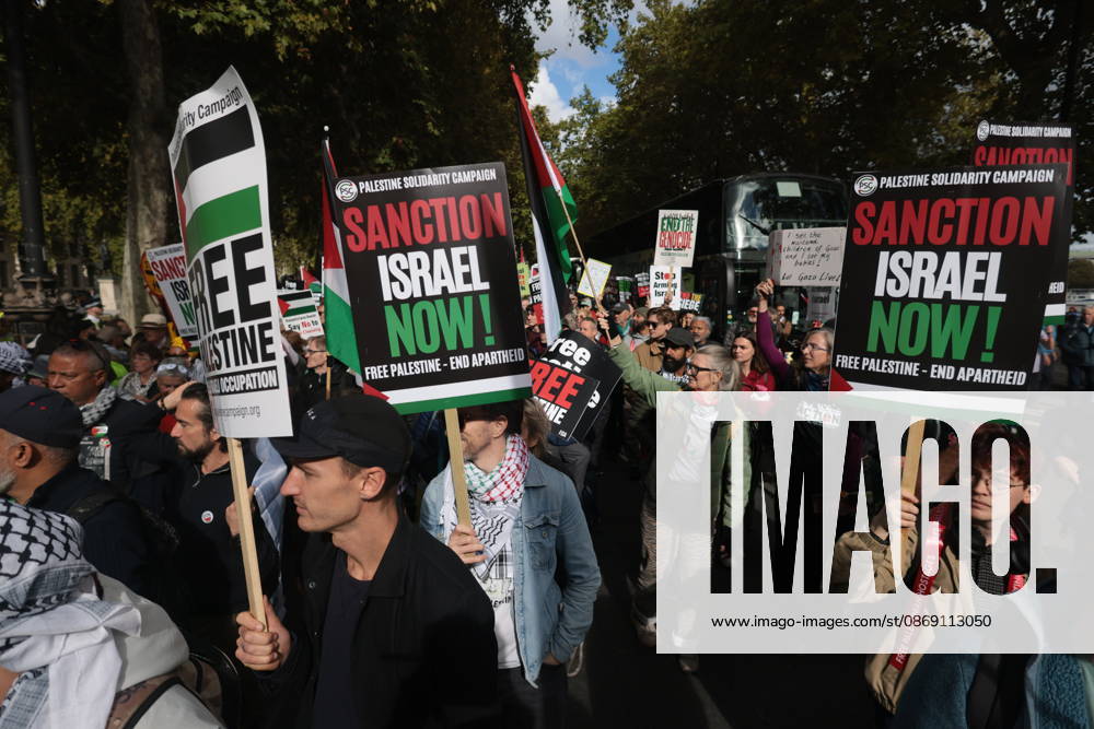 London, United Kingdom. Palestine Coalition Protest. Palestine Coalition protest march through London, with zionist counter protesters gathered outside New Scotland Yard.