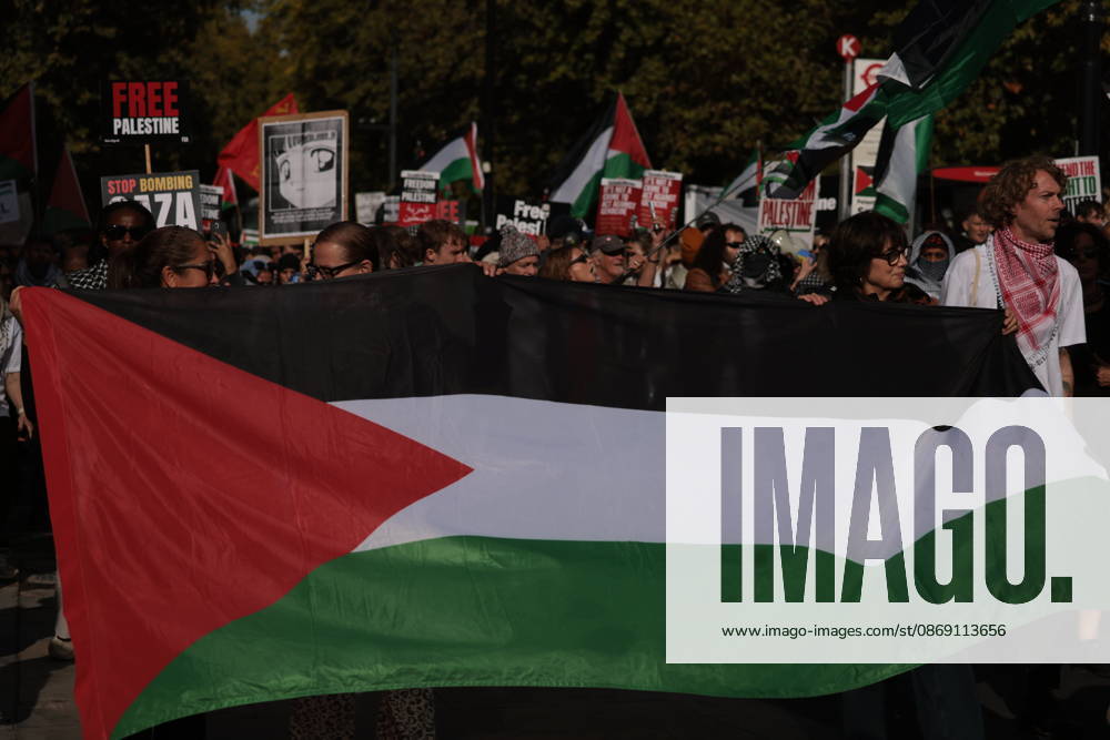 London, United Kingdom. Palestine Coalition Protest. Palestine Coalition protest march through London, with zionist counter protesters gathered outside New Scotland Yard.