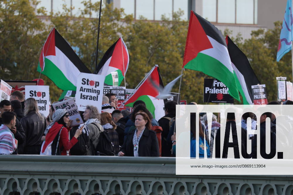 London, United Kingdom. Palestine Coalition Protest. Palestine Coalition protest march through London, with zionist counter protesters gathered outside New Scotland Yard.