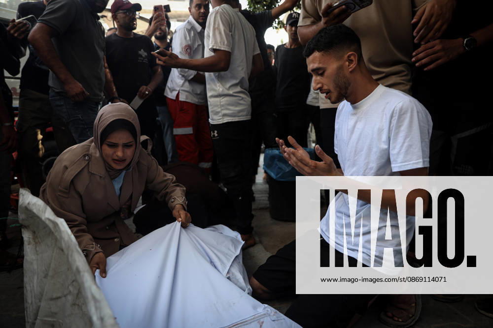 Israeli army continues attacks on Gaza despite ceasefire GAZA CITY, GAZA, PALESTINE - OCTOBER 10: Palestinians mourn after losing their loved ones in an Israeli attack on Gaza City, as Israeli army continues its attacks on the Gaza Strip despite the ceasefire, in Gaza City, Palestine, on October 10, 2026. The bodies of those killed in the attack were brought to Al-Shifa Hospital. Abdalhkem Abu Riash Anadolu Gaza City Gaza. Editorial use only. Please get in touch for any other usage.