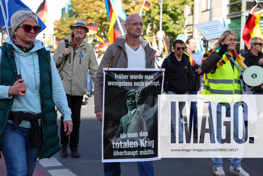 Demonstrators gather in Berlin for the Project M1llion rally against the German government. Participants take to the streets to voice their opposition to government policies, displaying banners and expressing their political demands. The demonstration brings together people seeking to make their concerns heard and draw public attention to their criticism of the country s political leadership. Berlin Germany - ZUMAc291 20261010_zip_c291_002