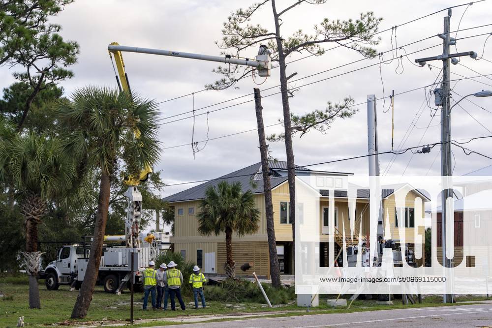 Crews work to repair power lines after a tree fell on them as Hurricane Isaias came ashore..Hurricane Isaias made landfall Friday, October 9 along the U.S. Gulf coast. Orange Beach USA - ZUMAs197 20261010_aaa_s197_004