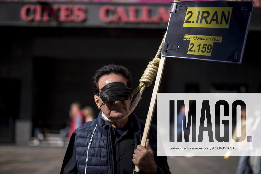 A protester holds a placard and a noose around their neck during a rally against the death penalty in Callao Square in central Madrid. World Day Against the Death Penalty has been observed every October 10th since 2003. Madrid Spain - ZUMAs197 20261010_aaa_s197_021